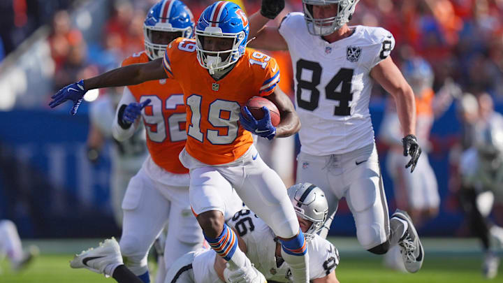 Oct 6, 2024; Denver, Colorado, USA; Denver Broncos wide receiver Marvin Mims Jr. (19) during a kickoff return in the second half against the Las Vegas Raiders at Empower Field at Mile High. Oct 6, 2024; Denver, Colorado, USA; Denver Broncos wide receiver Marvin Mims Jr. (19) during a kickoff return in the second half against the Las Vegas Raiders at Empower Field at Mile High.