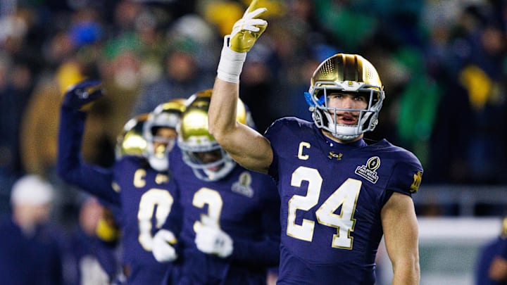 Notre Dame linebacker Jack Kiser (24) hypes up the crowd during the first round of the College Football Playoff between Notre Dame and Indiana at Notre Dame Stadium on Friday, Dec. 20, 2024, in South Bend. Notre Dame linebacker Jack Kiser (24) hypes up the crowd during the first round of the College Football Playoff between Notre Dame and Indiana at Notre Dame Stadium on Friday, Dec. 20, 2024, in South Bend.