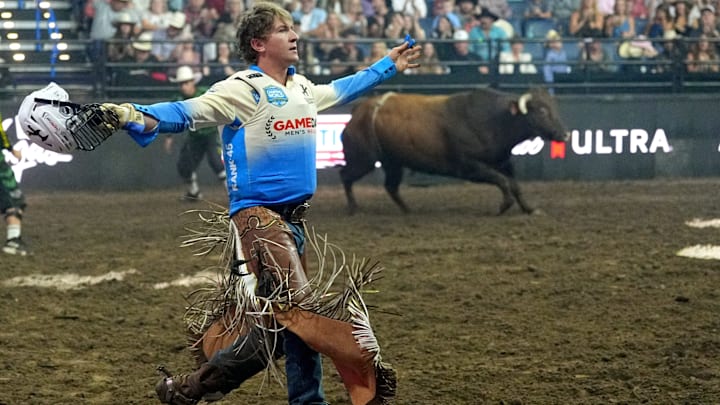 Oklahoma City Wildcatter Cord McFadden reacts after his ride on American Made during the PBR Teams: Wildcatter Days at Paycom Center in Oklahoma City, Saturday, July, 12, 2025.