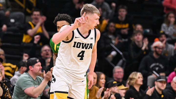 Feb 19, 2025; Iowa City, Iowa, USA; Iowa Hawkeyes guard Josh Dix (4) reacts during the first half against the Oregon Ducks at Carver-Hawkeye Arena. Mandatory Credit: Jeffrey Becker-Imagn Images