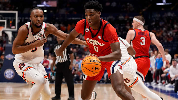 Mississippi forward Malik Dia (0) pushes past Auburn forward Chris Moore (5) during the first half of a Southeastern Conference tournament quarterfinal game at Bridgestone Arena in Nashville, Tenn., Friday, March 14, 2025. Mississippi forward Malik Dia (0) pushes past Auburn forward Chris Moore (5) during the first half of a Southeastern Conference tournament quarterfinal game at Bridgestone Arena in Nashville, Tenn., Friday, March 14, 2025.