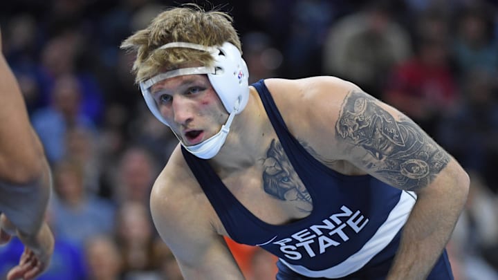 Josh Barr of the Penn State Nittany Lions wrestles Stephen Buchanan of the Iowa Hawkeyes during the 2025 NCAA Wrestling Championship at Wells Fargo Center.
