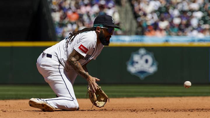 Jun 18, 2026; Seattle, Washington, USA; Seattle Mariners third baseman J.P. Crawford (3) fields a ground ball against the Baltimore Orioles during the fourth inning at T-Mobile Park. Mandatory Credit: Joe Nicholson-Imagn Images