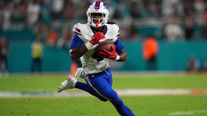 Buffalo Bills running back James Cook runs with the ball against the Miami Dolphins.