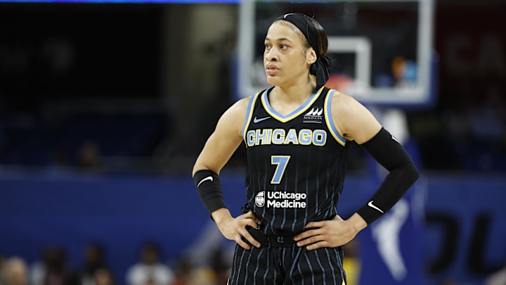 Aug 25, 2024; Chicago, Illinois, USA; Chicago Sky guard Chennedy Carter (7) looks on during the first half at Wintrust Arena. Mandatory Credit: Kamil Krzaczynski-Imagn Images