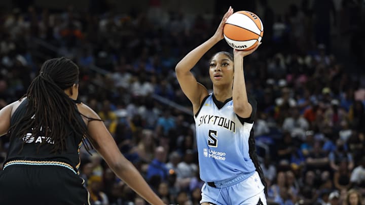 Jul 13, 2024; Chicago, Illinois, USA; Chicago Sky forward Angel Reese (5) shoots against the New York Liberty during the second half of a WNBA game at Wintrust Arena. Mandatory Credit: Kamil Krzaczynski-Imagn Images Jul 13, 2024; Chicago, Illinois, USA; Chicago Sky forward Angel Reese (5) shoots against the New York Liberty during the second half of a WNBA game at Wintrust Arena. Mandatory Credit: Kamil Krzaczynski-Imagn Images