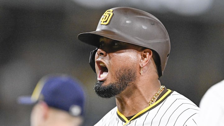 Sep 22, 2025; San Diego, California, USA; San Diego Padres first baseman Luis Arraez (4) celebrates after hitting an RBI single during the seventh inning against the Milwaukee Brewers at Petco Park. Mandatory Credit: Denis Poroy-Imagn Images Sep 22, 2025; San Diego, California, USA; San Diego Padres first baseman Luis Arraez (4) celebrates after hitting an RBI single during the seventh inning against the Milwaukee Brewers at Petco Park. Mandatory Credit: Denis Poroy-Imagn Images