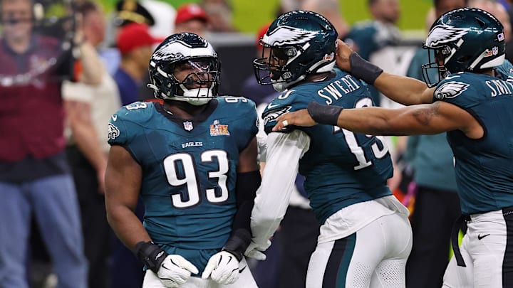 Feb 9, 2025; New Orleans, LA, USA; Philadelphia Eagles defensive tackle Milton Williams (93) celebrates with defensive end Brandon Graham (55) after a play against the Kansas City Chiefs during the first half of Super Bowl LIX at Caesars Superdome. Mandatory Credit: Bill Streicher-Imagn Images
