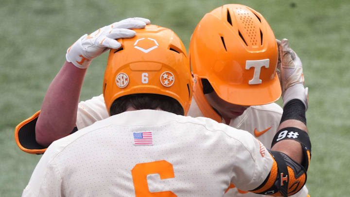 Tennessee's Dalton Bargo (16) and Gavin Kilen (6) celebrating Bargo's home run during an NCAA college baseball game against St. Bonaventure on Sunday, March 9, 2025, in Knoxville, Tenn.