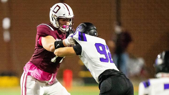 Dowling Catholic’s Carter Barrett (77) blocks during a game against Waukee on Oct. 10, 2025, at Valley Stadium in West Des Moines. Dowling Catholic’s Carter Barrett (77) blocks during a game against Waukee on Oct. 10, 2025, at Valley Stadium in West Des Moines.