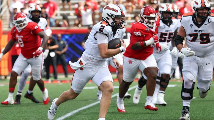 Sep 5, 2026; Houston, Texas, USA; Oregon State Beavers quarterback Braden Atkinson (2) runs with the ball and scores a touchdown during the first quarter against the Houston Cougars at TDECU Stadium. Mandatory Credit: Troy Taormina-Imagn Images