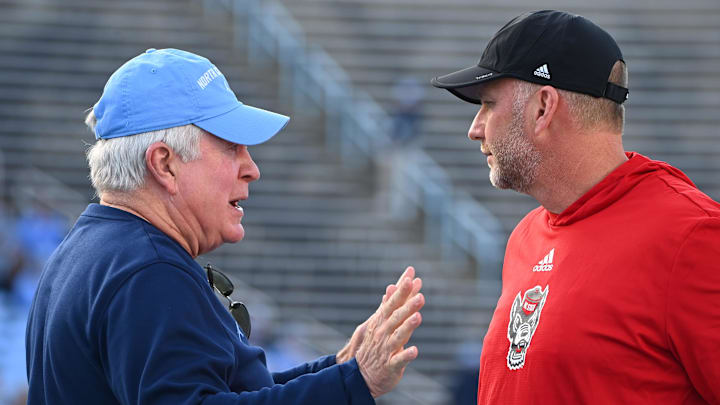 UNC football head coach Mack Brown and NC State football head coach Dave Doeren UNC football head coach Mack Brown and NC State football head coach Dave Doeren