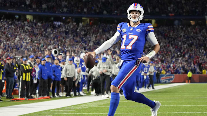 Sep 7, 2025; Orchard Park, New York, USA;  Buffalo Bills quarterback Josh Allen (17) -rtb for a touchdown  during the fourth quarter against the Baltimore Ravens at Highmark Stadium. Mandatory Credit: Gregory Fisher-Imagn Images
