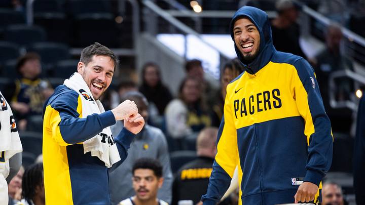 Oct 17, 2024; Indianapolis, Indiana, USA; Indiana Pacers guard T.J. McConnell (9) and guard Tyrese Haliburton (0) cheer in the second half against the Charlotte Hornets at Gainbridge Fieldhouse. Mandatory Credit: Trevor Ruszkowski-Imagn Images Oct 17, 2024; Indianapolis, Indiana, USA; Indiana Pacers guard T.J. McConnell (9) and guard Tyrese Haliburton (0) cheer in the second half against the Charlotte Hornets at Gainbridge Fieldhouse. Mandatory Credit: Trevor Ruszkowski-Imagn Images