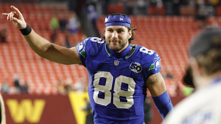 Nov 2, 2025; Landover, Maryland, USA; Seattle Seahawks tight end AJ Barner (88) celebrates while leaving the field after defeating the Washington Commanders at Northwest Stadium. Mandatory Credit: Amber Searls-Imagn Images