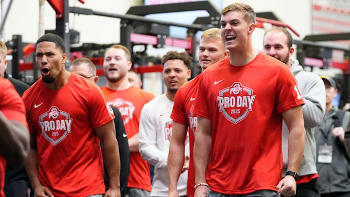 Ohio State Buckeyes quarterback Will Howard and linebacker Cody Simon react in the weightroom during the pro day for NFL scouts at the Woody Hayes Athletic Cente on March 26, 2025. Ohio State Buckeyes quarterback Will Howard and linebacker Cody Simon react in the weightroom during the pro day for NFL scouts at the Woody Hayes Athletic Cente on March 26, 2025.