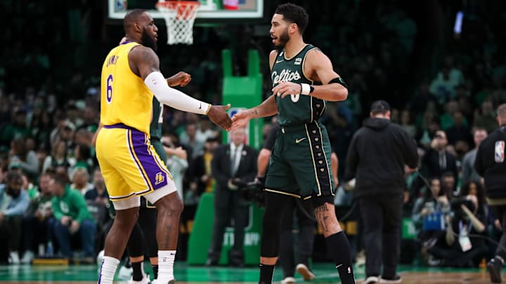 Jan 28, 2023; Boston, Massachusetts, USA; Boston Celtics forward Jayson Tatum (0) and Los Angeles