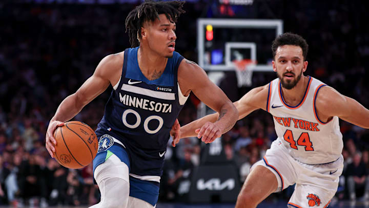 Oct 13, 2024; New York, New York, USA; Minnesota Timberwolves guard Terrence Shannon Jr. (00) dribbles in front of New York Knicks guard Landry Shamet (44) during the second half at Madison Square Garden. Mandatory Credit: Vincent Carchietta-Imagn Images Oct 13, 2024; New York, New York, USA; Minnesota Timberwolves guard Terrence Shannon Jr. (00) dribbles in front of New York Knicks guard Landry Shamet (44) during the second half at Madison Square Garden. Mandatory Credit: Vincent Carchietta-Imagn Images