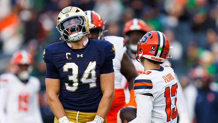 Notre Dame linebacker Drayk Bowen (34) celebrates after sacking Syracuse quarterback Joseph Filardi (13) in the first half of a NCAA football game at Notre Dame Stadium on Saturday, Nov. 22, 2025, in South Bend. Notre Dame linebacker Drayk Bowen (34) celebrates after sacking Syracuse quarterback Joseph Filardi (13) in the first half of a NCAA football game at Notre Dame Stadium on Saturday, Nov. 22, 2025, in South Bend.