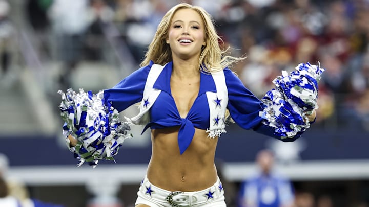Dallas Cowboys cheerleader performs during the game against the Washington Commanders at AT&T Stadium.