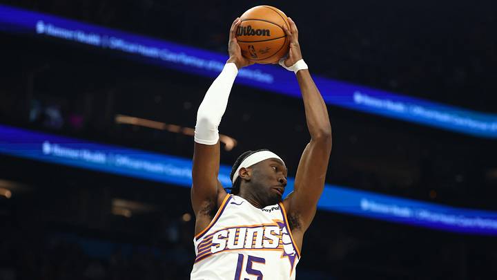 Feb 5, 2026; Phoenix, Arizona, USA; Phoenix Suns center Mark Williams (15) grabs a rebound against the Golden State Warriors in the first half at Mortgage Matchup Center. Mandatory Credit: Mark J. Rebilas-Imagn Images