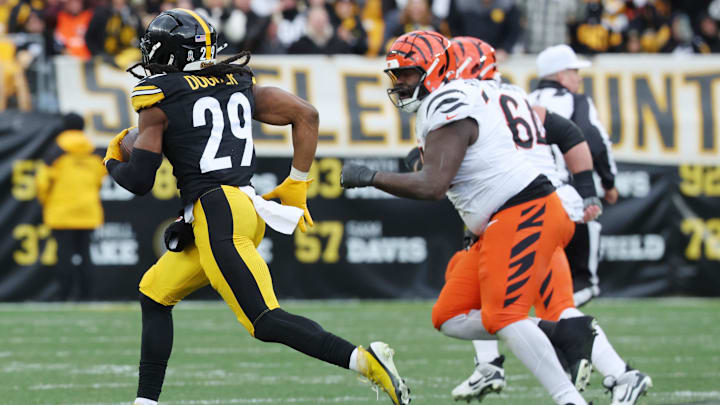 Nov 16, 2025; Pittsburgh, Pennsylvania, USA; Pittsburgh Steelers safety Kyle Dugger (29) intercepts the ball against the Cincinnati Bengals during the second half at Acrisure Stadium. Mandatory Credit: Charles LeClaire-Imagn Images