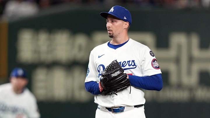Mar 16, 2025; Bunkyo, Tokyo, Japan; Los Angeles Dodgers starting pitcher Blake Snell (7) stands on the mound during the first inning against the Hanshin Tigers at Tokyo Dome. Mandatory Credit: Darren Yamashita-Imagn Images
