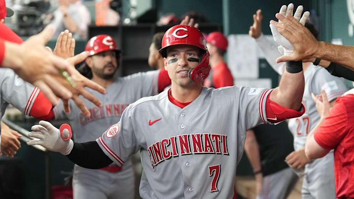 Apr 3, 2026; Arlington, Texas, USA; Cincinnati Reds left fielder Spencer Steer (7) celebrates his home run with teammates in the dugout against the Texas Rangers during the first inning at Globe Life Field. Mandatory Credit: Jim Cowsert-Imagn Images