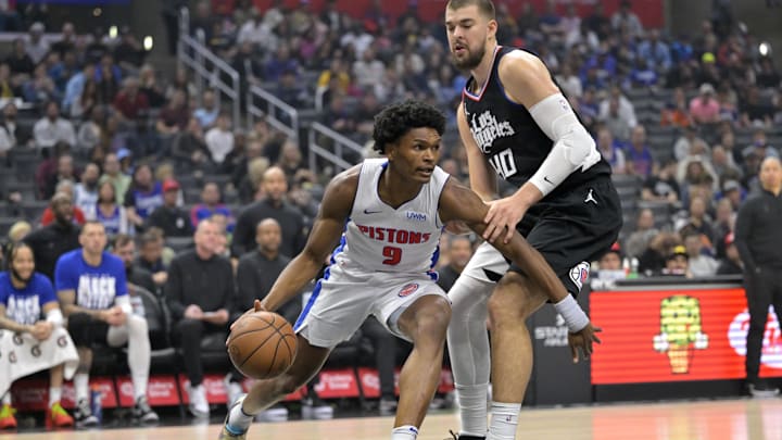 Feb 10, 2024; Los Angeles, California, USA;  Detroit Pistons forward Ausar Thompson (9) drives past Los Angeles Clippers center Ivica Zubac (40) in the first half at Crypto.com Arena. Mandatory Credit: Jayne Kamin-Oncea-Imagn Images