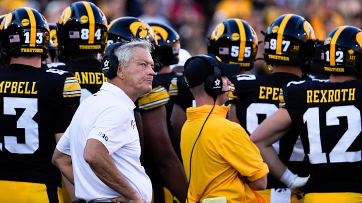 Iowa Hawkeyes head coach Kirk Ferentz huddles with his team during a football game against the Indiana Hoosiers Sept. 27, 2025 at Kinnick Stadium in Iowa City, Iowa.