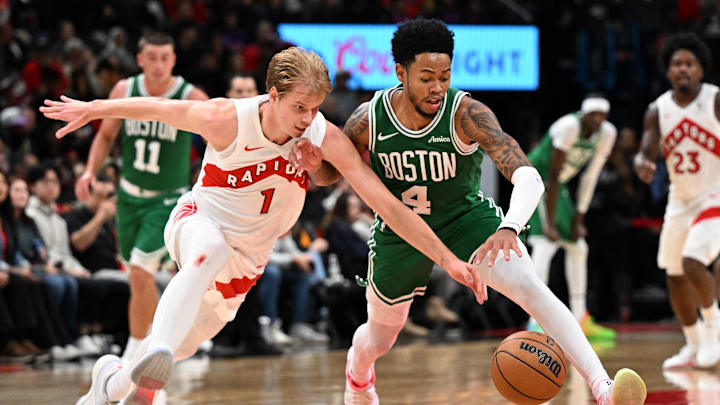 Oct 10, 2025; Toronto, Ontario, CAN; Toronto Raptors forward Gradey Dick (1) knocks the ball away from Boston Celtics guard Anfernee Simons (4) in the second half at Scotiabank Arena. Mandatory Credit: Dan Hamilton-Imagn Images Oct 10, 2025; Toronto, Ontario, CAN; Toronto Raptors forward Gradey Dick (1) knocks the ball away from Boston Celtics guard Anfernee Simons (4) in the second half at Scotiabank Arena. Mandatory Credit: Dan Hamilton-Imagn Images