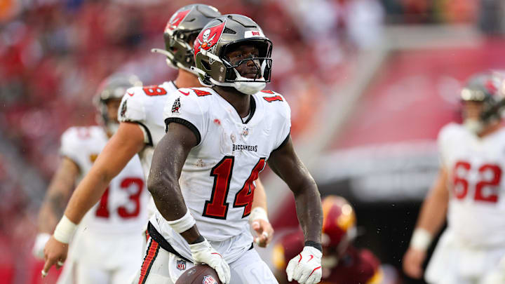 Sep 8, 2024; Tampa, Florida, USA; Tampa Bay Buccaneers wide receiver Chris Godwin (14) reacts after a play against the Washington Commanders in the fourth quarter at Raymond James Stadium.  