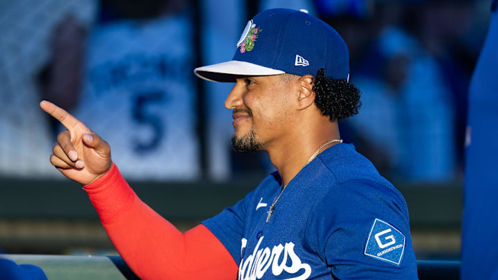 Mar 12, 2026; Phoenix, Arizona, USA; Los Angeles Dodgers designated hitter Santiago Espinal reacts against the Cincinnati Reds during a spring training game at Camelback Ranch-Glendale. Mandatory Credit: Mark J. Rebilas-Imagn Images