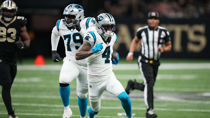 Dec 14, 2025; New Orleans, Louisiana, USA; Carolina Panthers wide receiver Tetairoa McMillan (4) runs the ball during the second quarter against the New Orleans Saints at Caesars Superdome. Mandatory Credit: Matthew Hinton-Imagn Images