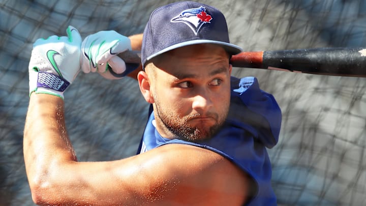 Aug 19, 2025; Pittsburgh, Pennsylvania, USA;  Toronto Blue Jays shortstop Bo Bichette (11) in the batting cage before the game against the Pittsburgh Pirates at PNC Park. Mandatory Credit: Charles LeClaire-Imagn Images