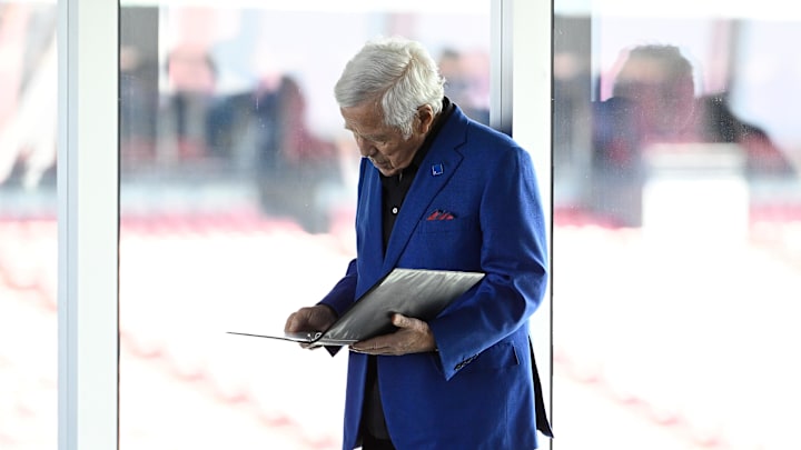 New England Patriots owner Robert Kraft looks at notes before a press conference at Gillette Stadium.