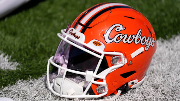 An Oklahoma State helmet is pictured before a college football game between the Oklahoma State Cowboys (OSU) and the West Virginia Mountaineers at Boone Pickens Stadium in Stillwater, Okla., Saturday, Oct. 5, 2024.