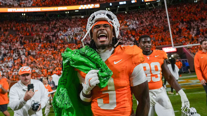 Tennessee defensive back Jermod McCoy yells while carrying a deflated gator after defeating Florida at Neyland Stadium 