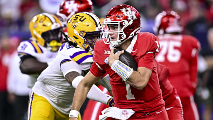 Dec 27, 2025; Houston, TX, USA; Houston Cougars quarterback Conner Weigman (1) runs the ball during the second half against the Louisiana State Tigers at NRG Stadium. Dec 27, 2025; Houston, TX, USA; Houston Cougars quarterback Conner Weigman (1) runs the ball during the second half against the Louisiana State Tigers at NRG Stadium.