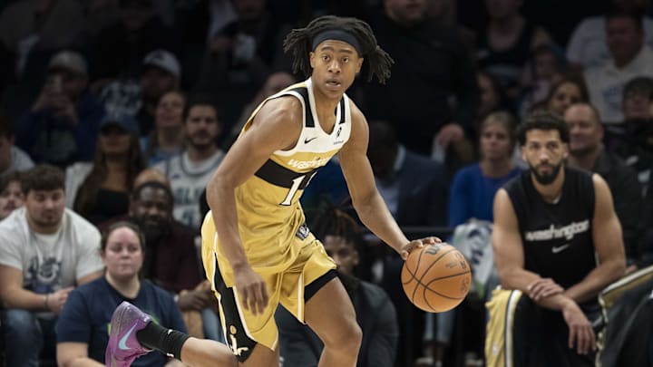 Nov 19, 2025; Minneapolis, Minnesota, USA; Washington Wizards guard Tre Johnson (12) dribbles the ball against the Minnesota Timberwolves in the second half at Target Center. Mandatory Credit: Jesse Johnson-Imagn Images