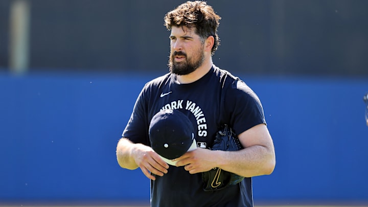 Feb 13, 2026; Tampa, FL, USA;  New York Yankees pitcher Carlos Rodon (55) works out during spring training practices at George M. Steinbrenner Field. Mandatory Credit: Kim Klement Neitzel-Imagn Images