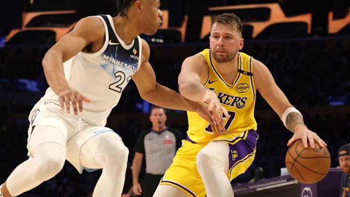 Los Angeles Lakers guard Luka Doncic dribbles against Minnesota Timberwolves guard Jaylen Clark during the second quarter at Crypto.com Arena in Los Angeles on Feb. 27, 2025. Los Angeles Lakers guard Luka Doncic dribbles against Minnesota Timberwolves guard Jaylen Clark during the second quarter at Crypto.com Arena in Los Angeles on Feb. 27, 2025.