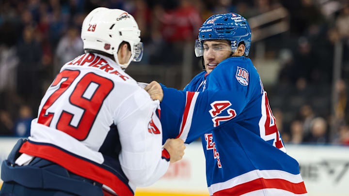 Apr 5, 2026; New York, New York, USA; New York Rangers center Noah Laba (42) fights with Washington Capitals center Hendrix Lapierre (29) during the third period at Madison Square Garden. Mandatory Credit: Danny Wild-Imagn Images