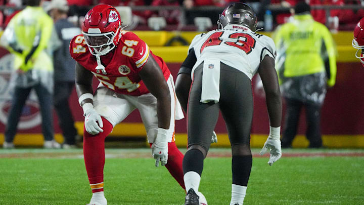 Nov 4, 2024; Kansas City, Missouri, USA; Kansas City Chiefs offensive tackle Wanya Morris (64) at the line of scrimmage against the Tampa Bay Buccaneers during the game at GEHA Field at Arrowhead Stadium. Mandatory Credit: Denny Medley-Imagn Images Nov 4, 2024; Kansas City, Missouri, USA; Kansas City Chiefs offensive tackle Wanya Morris (64) at the line of scrimmage against the Tampa Bay Buccaneers during the game at GEHA Field at Arrowhead Stadium. Mandatory Credit: Denny Medley-Imagn Images
