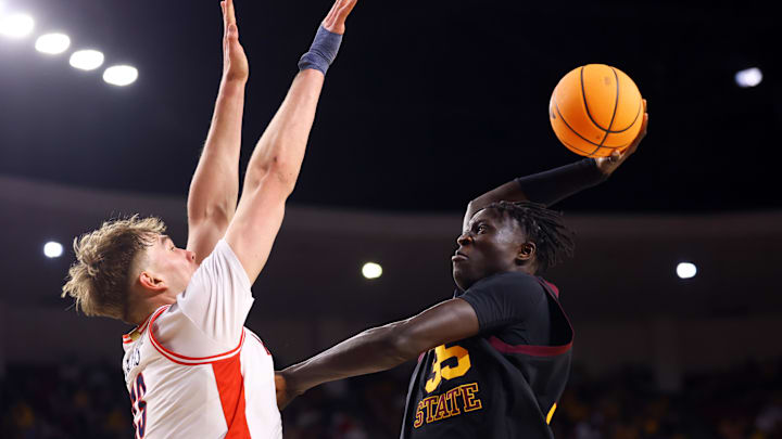 Jan 31, 2026; Tempe, Arizona, USA; Arizona State Sun Devils center Massamba Diop (35) goes up for a dunk against Arizona Wildcats center Motiejus Krivas at Desert Financial Arena. Mandatory Credit: Mark J. Rebilas-Imagn Images