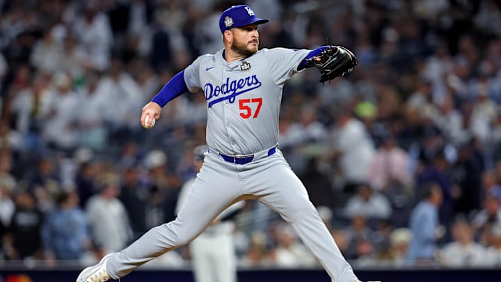 Los Angeles Dodgers pitcher Ryan Brasier pitches during third inning against the New York Yankees in the 2024 World Series.