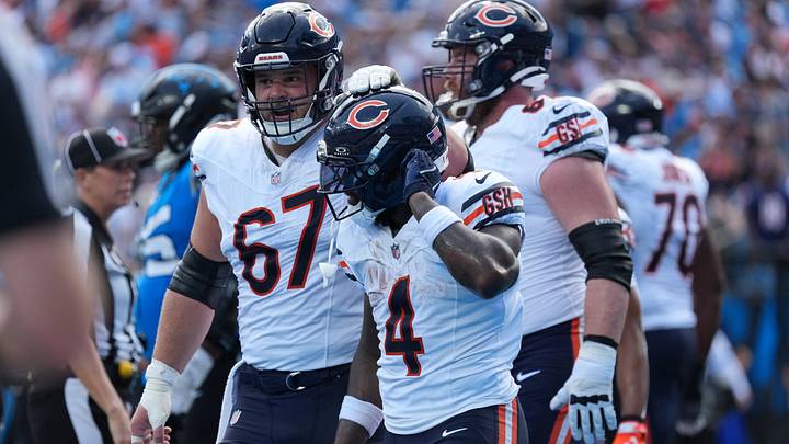 Sep 13, 2026; Charlotte, North Carolina, USA; Chicago Bears center Garrett Bradbury (67) reacts to a touchdown scored by running back D'Andre Swift (4) in the first quarter against the Carolina Panthers at Bank of America Stadium. Mandatory Credit: Jim Dedmon-Imagn Images Sep 13, 2026; Charlotte, North Carolina, USA; Chicago Bears center Garrett Bradbury (67) reacts to a touchdown scored by running back D'Andre Swift (4) in the first quarter against the Carolina Panthers at Bank of America Stadium. Mandatory Credit: Jim Dedmon-Imagn Images