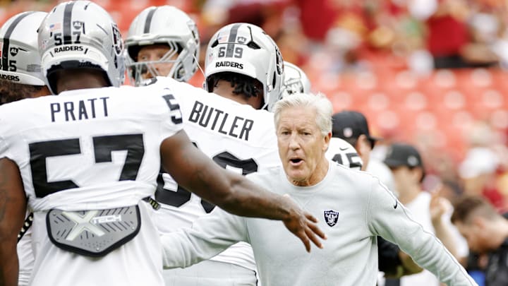Sep 21, 2025; Landover, Maryland, USA; The Las Vegas Raiders head coach Pete Carroll huddles with the team before the game against the Washington Commanders at Northwest Stadium. Mandatory Credit: Amber Searls-Imagn Images