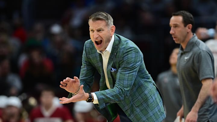 Mar 21, 2025; Cleveland, OH, USA; Alabama Crimson Tide head coach Nate Oats reacts in the second half against the Robert Morris Colonials during the NCAA Tournament First Round at Rocket Arena. Mandatory Credit: Ken Blaze-Imagn Images