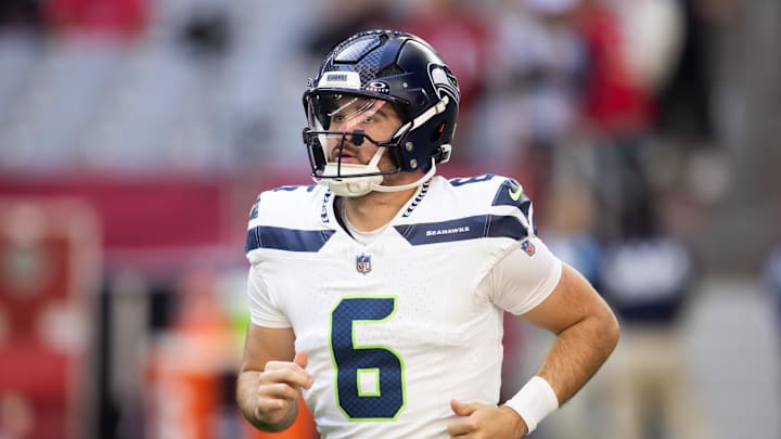 Dec 8, 2024; Glendale, Arizona, USA; Seattle Seahawks quarterback Sam Howell (6) against the Arizona Cardinals at State Farm Stadium. Mandatory Credit: Mark J. Rebilas-Imagn Images